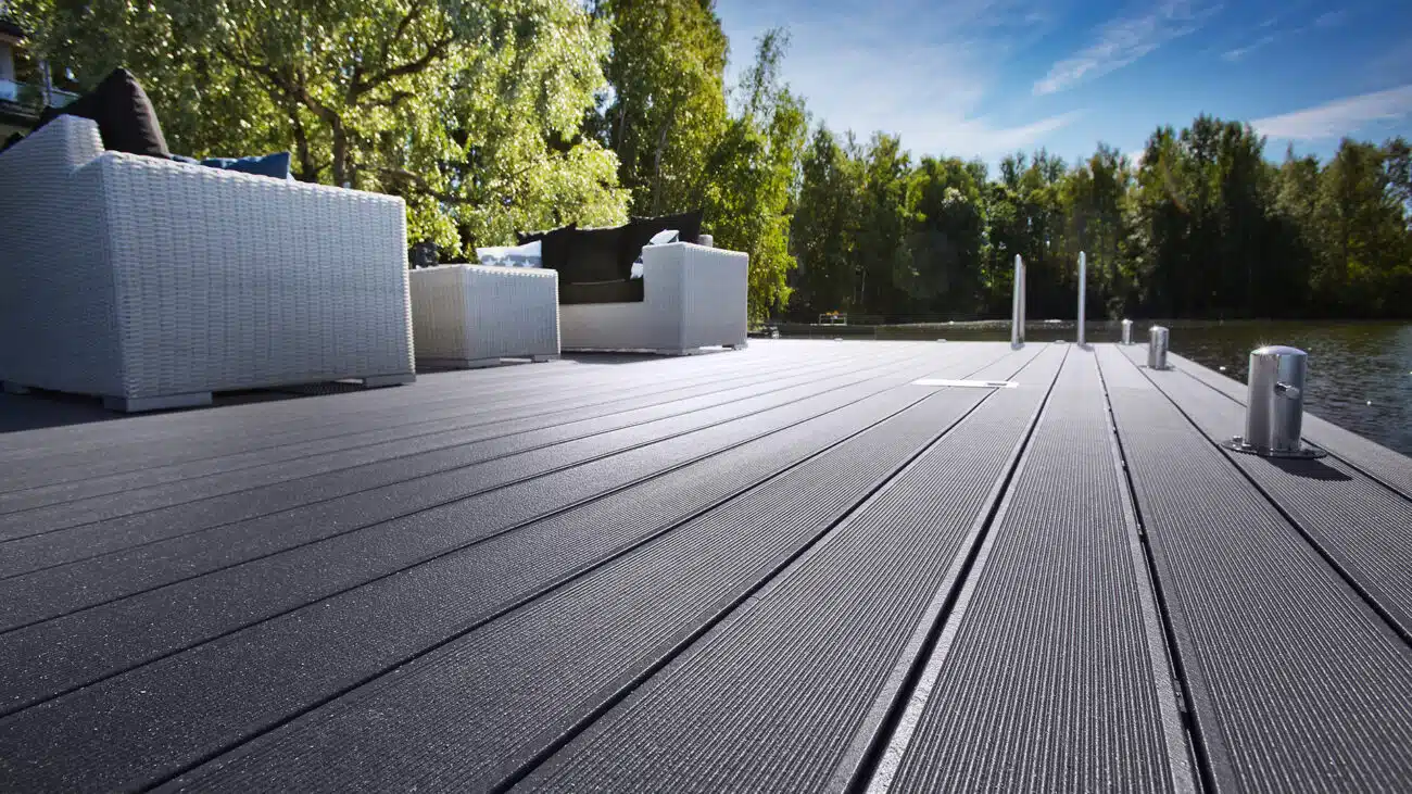 Composite deck is comprised of wood fibres, plastics, and bonding agents. The mixture is heated into a liquefied form, moulded into planks, and cooled.
