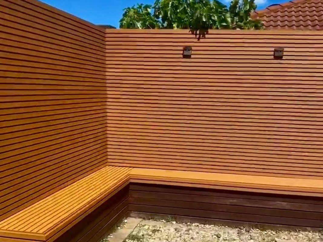 finished corner with cladding walls and composite bench seating